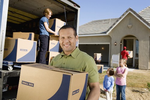 Fragile household items carefully wrapped for a move