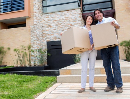 Professional movers handling furniture during a local relocation